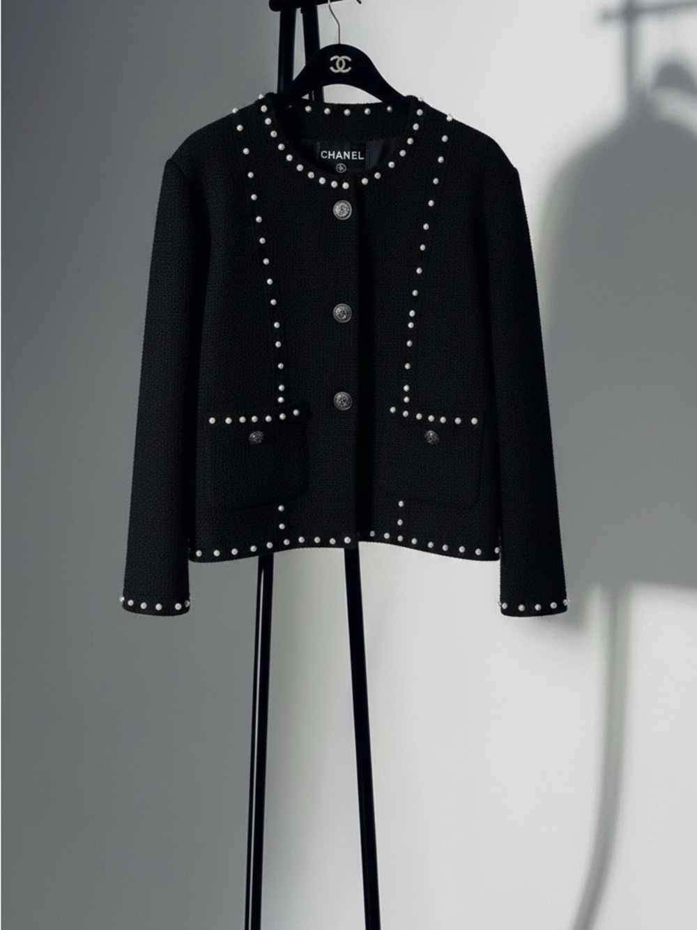 CHANEL Black Tweed Jacket with Pearl trim and branded buttons